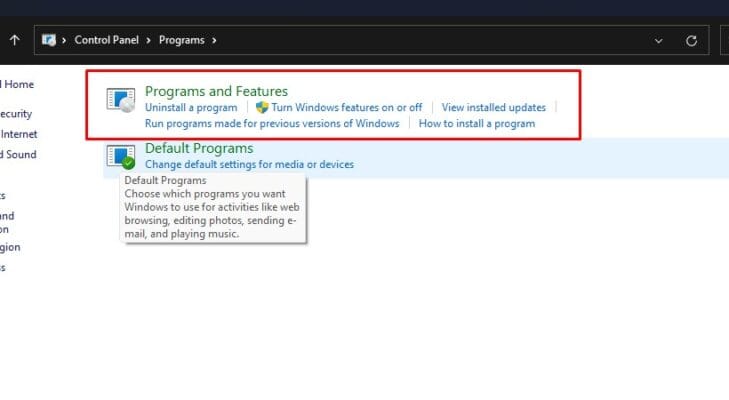 Chọn "Programs and Features"